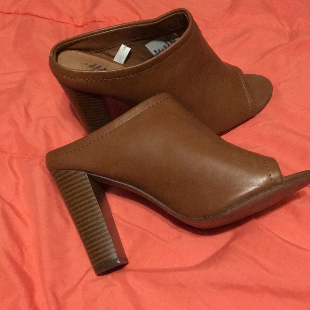 Open toe high heels not sure of the brand